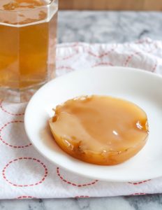 This is a mature scoby - after a few rounds of making kombucha, it will thicken, become smooth, and take uniform color (Image credit: Emma Christensen)